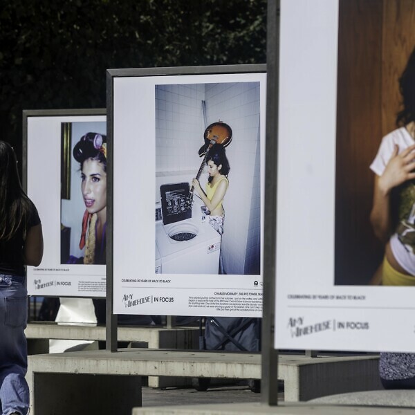 Photographs of Amy Winehouse on outdoor benches in King’s Cross