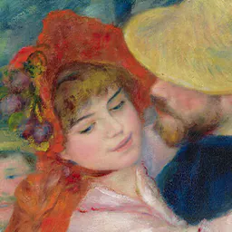 Two dancers close together, a woman in a red hat and a man in a straw hat